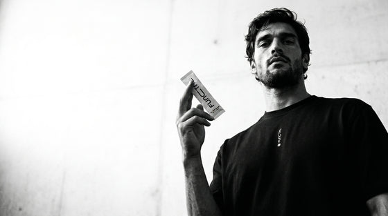 Athlete holding a sachet